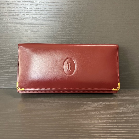 Cartier Handbags - SOLD!❌ Cartier Burgundy Long Wallet